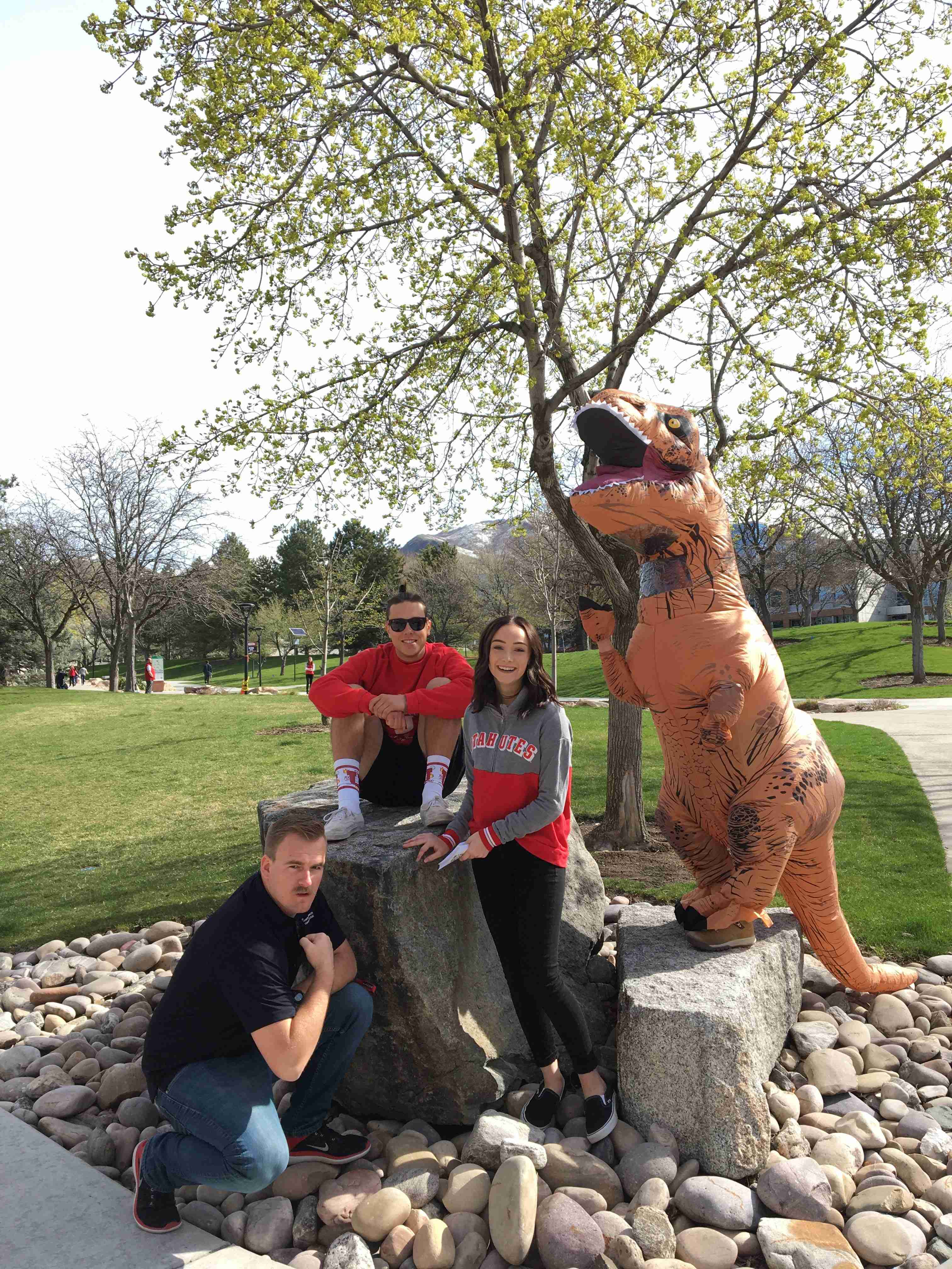 Student Ambassadors with the dinosaur mascot
