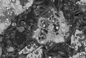 Scanning electron microscopy image of the tomb mortar. The C-A-S-H binding phase appears as gray while the volcanic scoriae (and leucite crystals) appear as light gray.